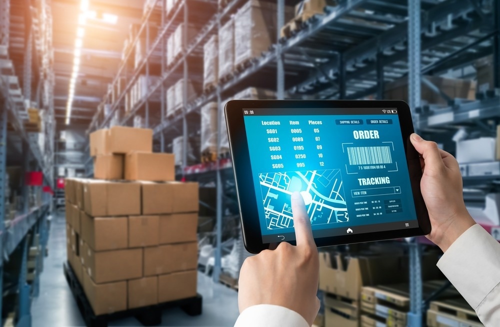 Warehouse management innovative software in computer for real time monitoring of goods package delivery .
