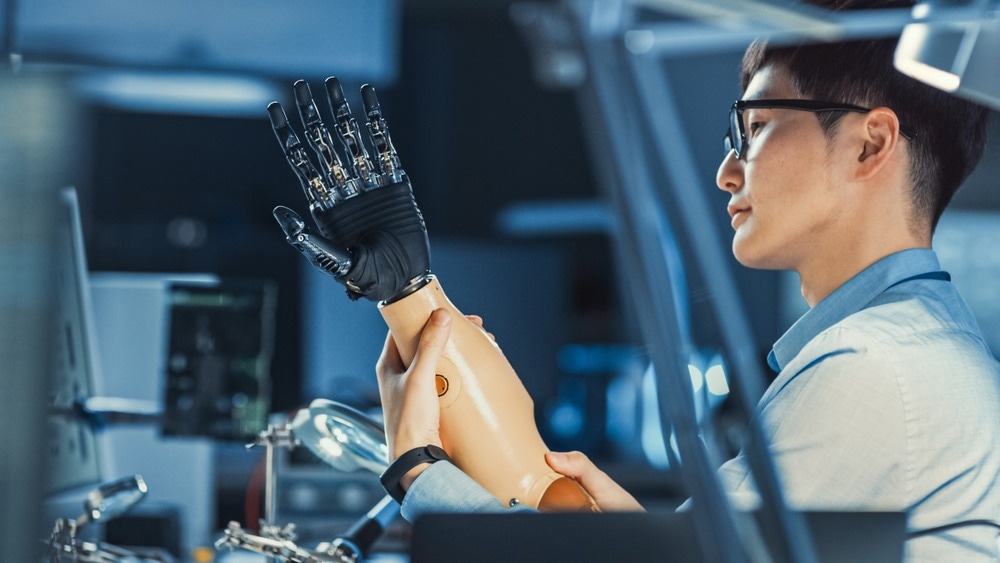Futuristic Prosthetic Robot Arm Being Tested by a Professional