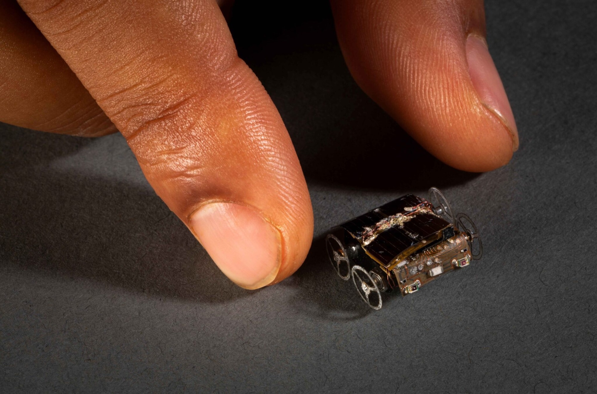MilliMobile: A Minuscule Self-Driving Robot Fueled by Light and Radio Waves