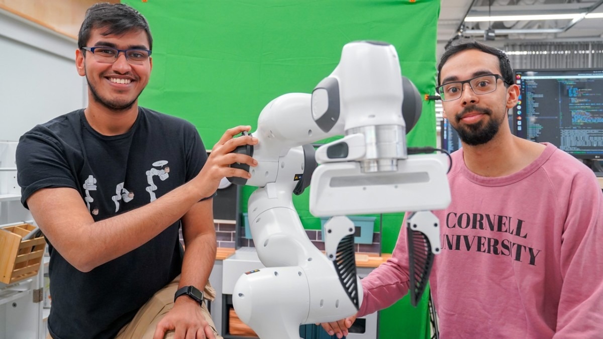 Kushal Kedia (left), a doctoral student in the field of computer science, and Prithwish Dan, M.S. ’26, are members of the development team behind RHyME, a system that allows robots to learn tasks by watching a single how-to video.