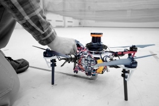Autonomous System of Drones to Search for Lost Hikers in Dense Forests