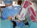 Neurosurgeon Performs Brain Surgery Using Robotic Technology