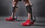 Unpowered Passive-Elastic Ankle Exoskeleton Helps Walk Using Less Energy